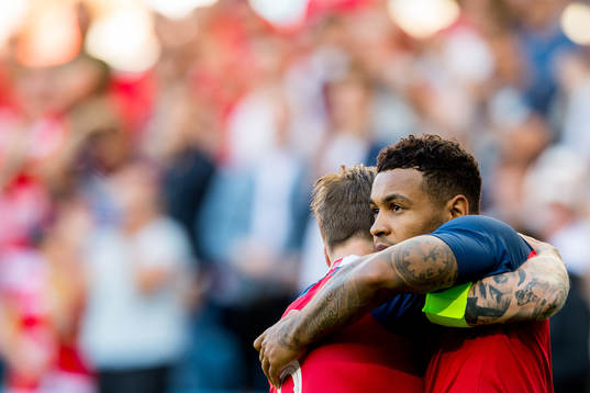 Joshua King of Norway celebrates with teammate Stefan