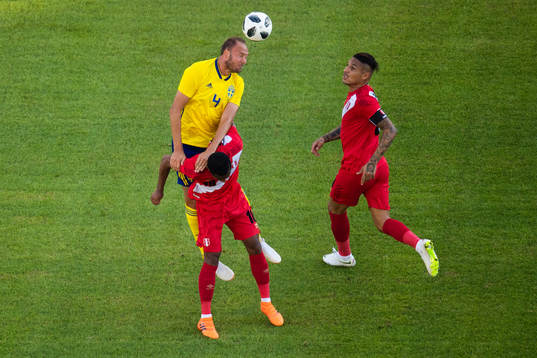 Andreas Granqvist of Sweden competes for the ball with