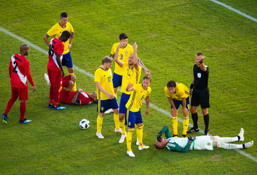 goalkeeper Robin Olsen of Sweden lies down