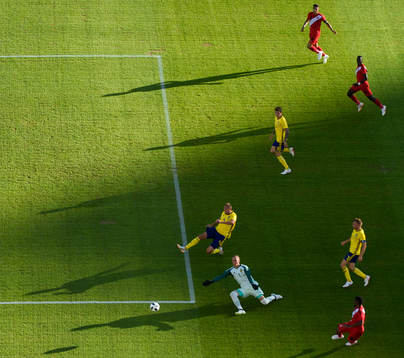 Goalkeeper Robin Olsen of Sweden saves a shot from