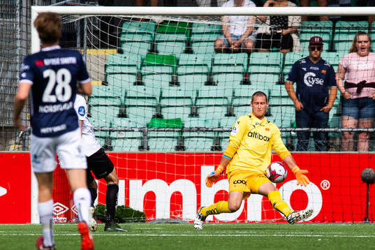 Goalkeeper Iven Austbø of Viking saves a shot from Sigurd