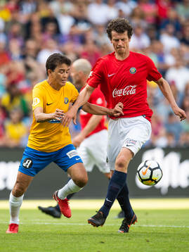 Bebeto of Brazil and <Dan Eggen of Norway competes for the