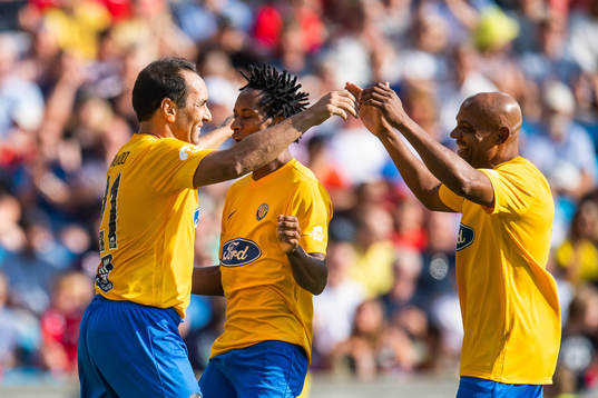 Edmundo of Brazil celebrates with team mates