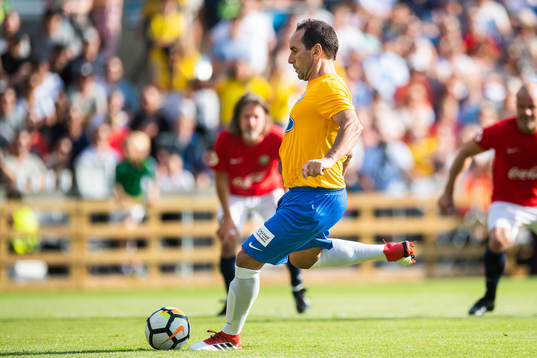 Edmundo of Brazil shoots a penalty kick