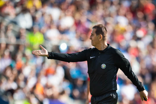Esse Baharmast, referee, awards a penalty for Brazil