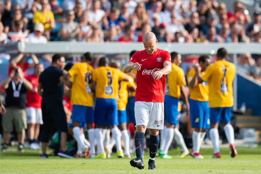 Stig Inge Bjørnebye of Norway looks dejected while Brazil