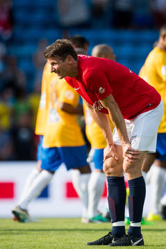 Tore André Flo of Norway looks dejected