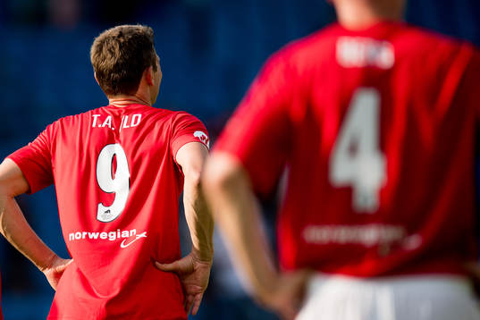 Tore André Flo of Norway looks dejected