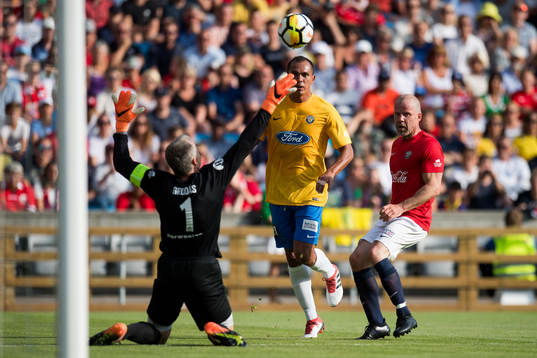 Goalkeeper Frode Grodås of Norway, Giovanni of Brazil and