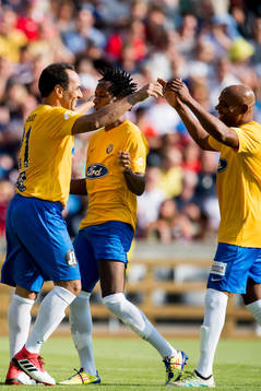 Edmundo of Brazil celebrates the 0-1 goal with teammates