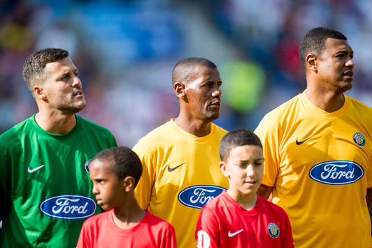 Goalkeeper Julio Cesar, Aldair and Junior Baiano of Brazil