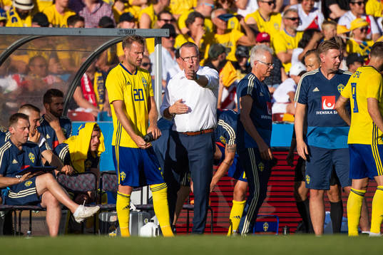 Ola Toivonen of Sweden is given instructions by Janne
