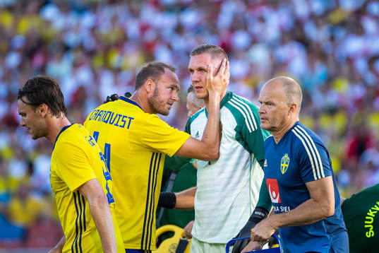 Andreas Granqvist of Sweden and goalkeeper Robin Olsen of