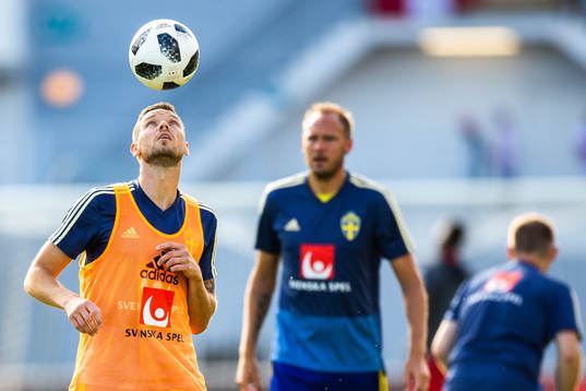 Marcus Berg of Sweden with a header