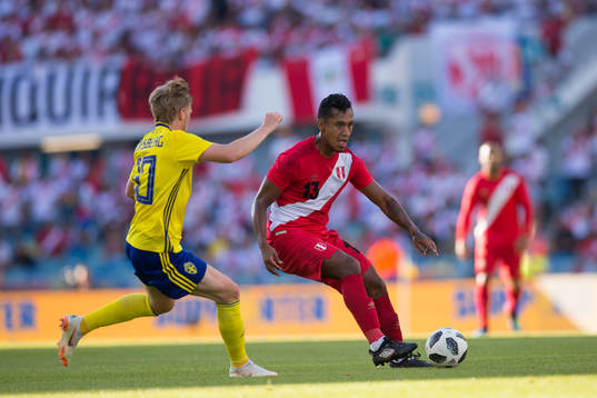 Emil Forsberg of Sweden and Renato Tapia of Peru