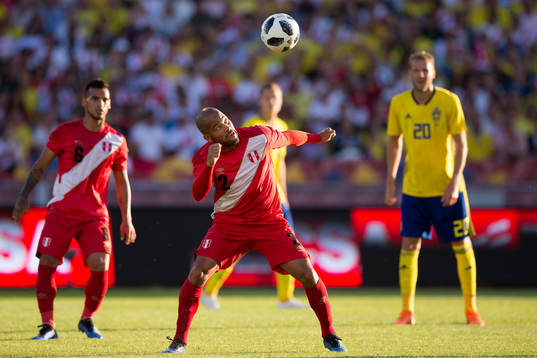 Albert Rodriguez of Peru with a header
