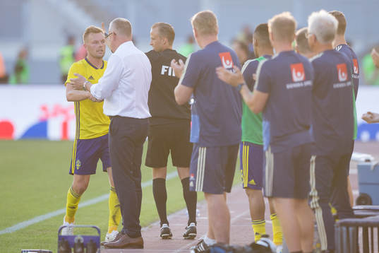 Sebastian Larsson of Sweden and Janne Andersson, head coach