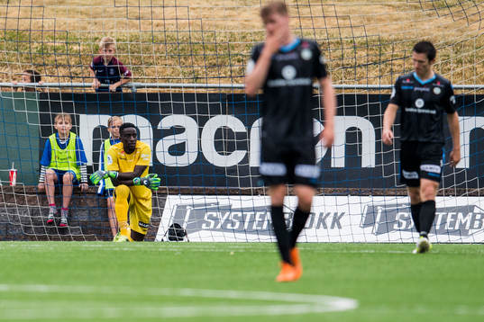 Goalkeeper Arnold Origi of Sandnes Ulf looks dejected