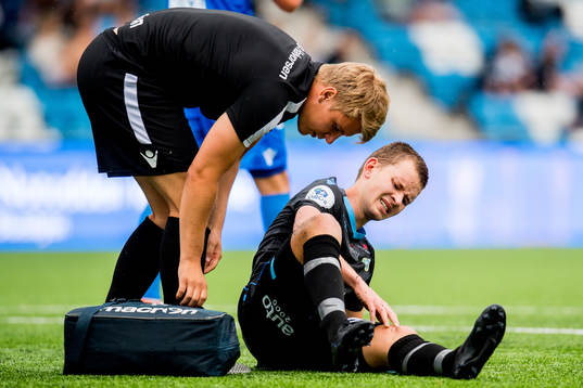 Vegard Østraat Erlien of Sandnes Ulf with an injury