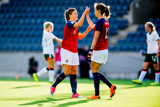 Maren Mjelde and Caroline Graham Hansen of Norway celebrate