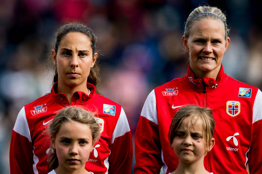 Ingrid Moe Wold and goalkeeper Ingrid Hjelmseth of Norway