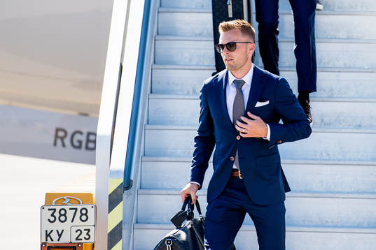 Sebastian Larsson of Sweden disembarks the plane when the
