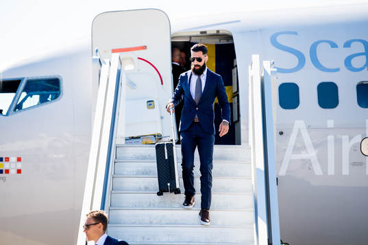 Jimmy Durmaz of Sweden disembarks the plane when the