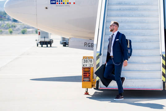 John Guidetti of Sweden disembarks the plane when the