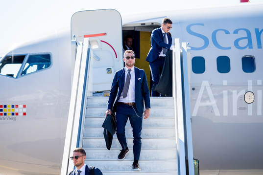 Marcus Berg and John Guidetti of Sweden disembark the plane