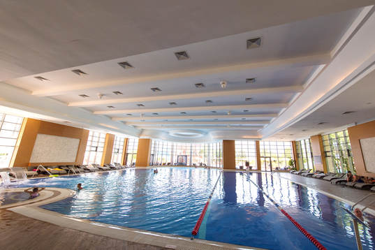 An inside swimming pool at the Kempinski Hotel