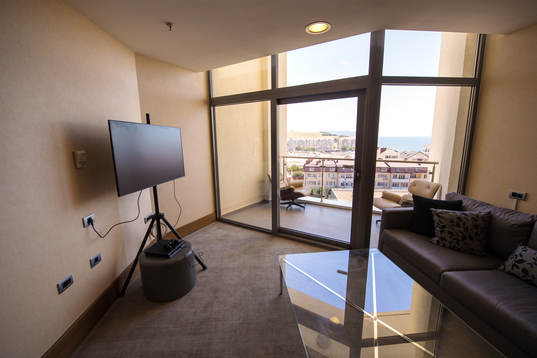 A room fitted with a tv and video games