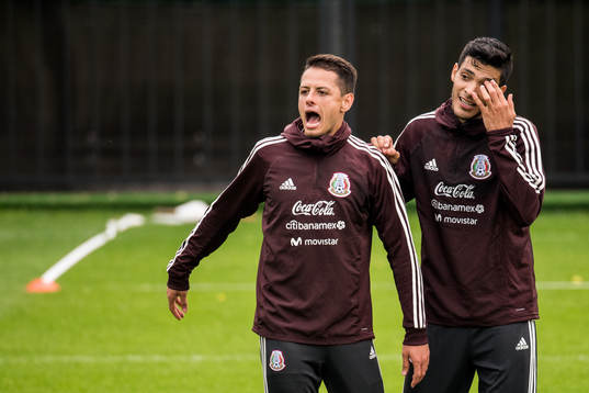 Javier Hernandez (left) of Mexico
