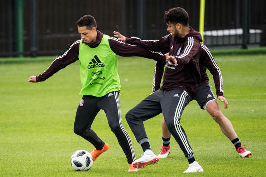 Javier Hernandez (left) of Mexico