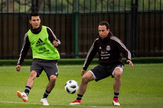 Hirving Lozano (left)  of Mexico