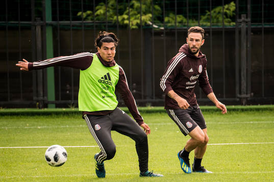 Miguel Layun (right) of Mexico