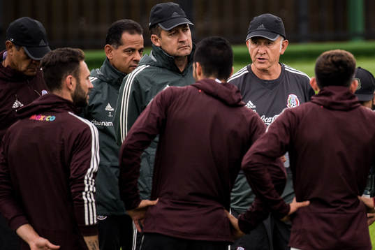 Juan Carlos Osorio, coach of Mexico talks to the players