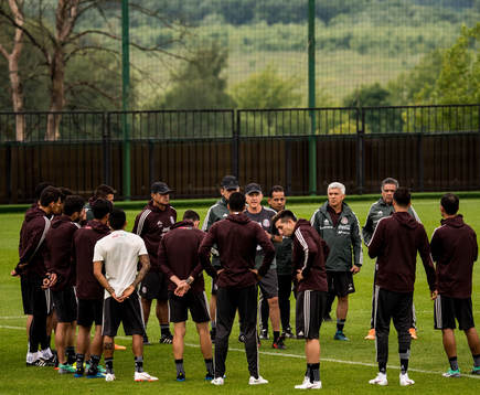 Juan Carlos Osorio, coach of Mexico talks to the players