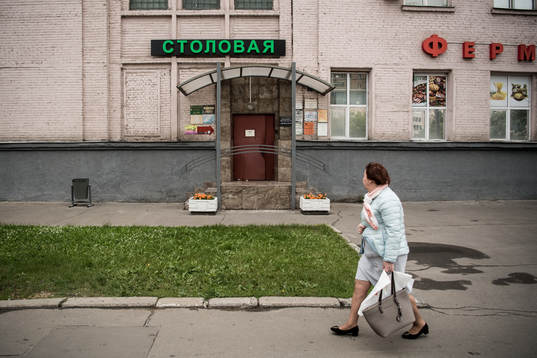 A woman walks at the streets in Moscow