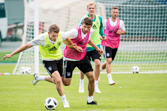 Matthias Ginter and Thomas Muller of Germany