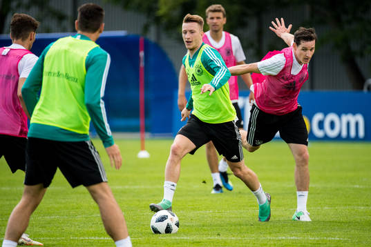 Marco Reus and Sebastian Rudy of Germany
