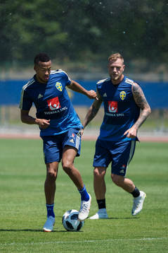 Martin Olsson and John Guidetti of the Swedish national