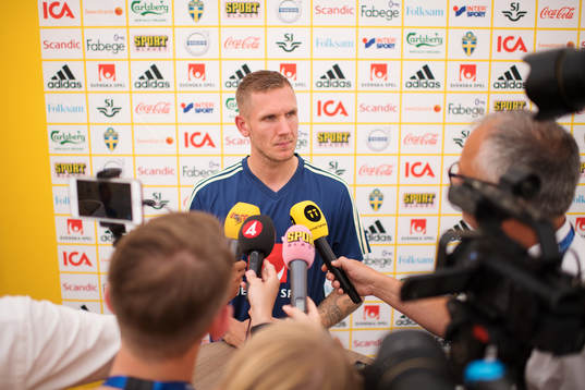 Robin Olsen of the Swedish national football team is being