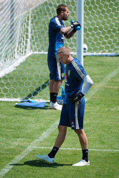 Goalkeepers Kristoffer Nordfeldt and Robin Olsen of the