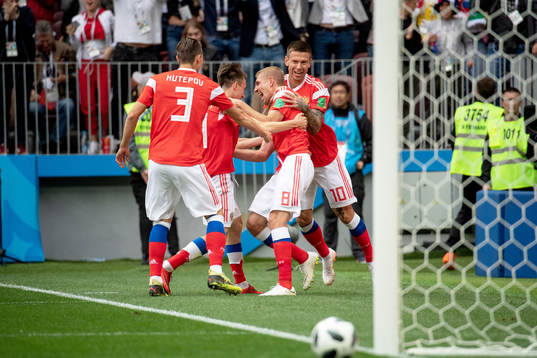 Iury Gazinsky of Russia celebrates with his teammates