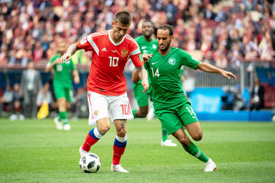 Fedor Smolov of Russia and Abdullah Otayf of Saudiarabia