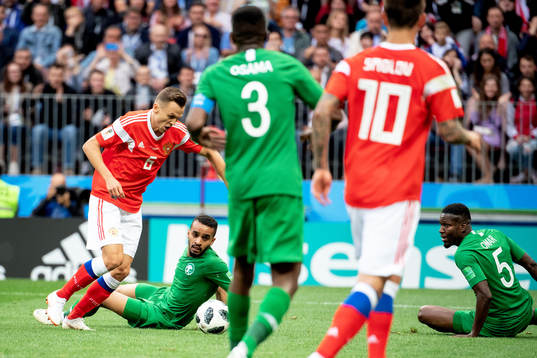 Denis Cheryshev of Russia scores 2-0