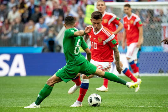 Fedor Smolov of Russia and Mohammed Alburayk of Saudiarabia