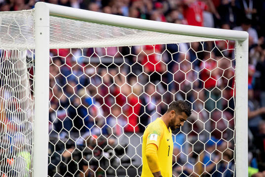 goalkeeper Abdullah Almuaiouf of Saudiarabia looks dejected