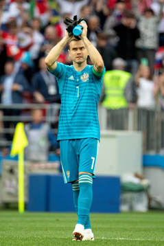 goalkeeper Igor Akinfeev of Russia celebrates