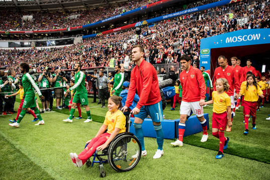 Goalkeeper Igor Akinfeev of Russia enters the pitch prior